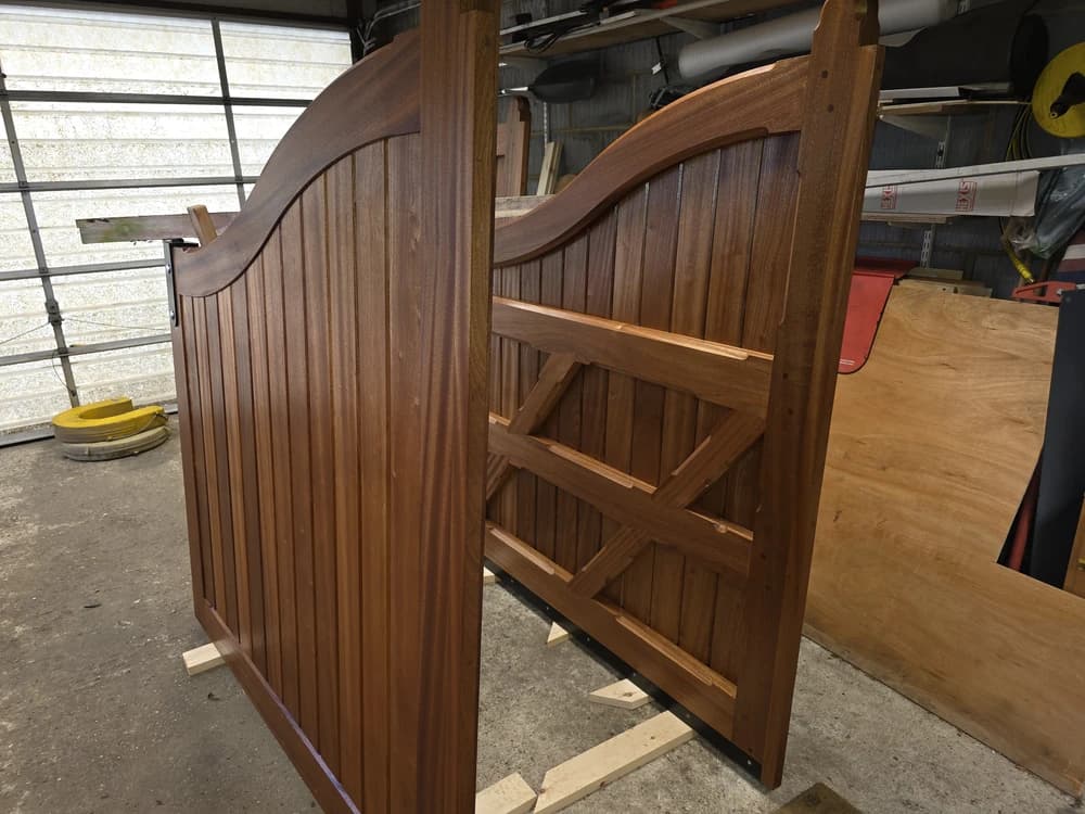 Hardwood curved-top gate panels being built in the workshop